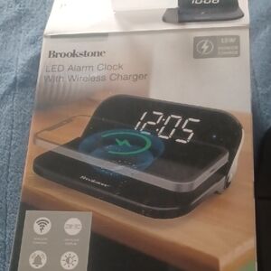 Brookstone Black LED Alarm Clock with Wireless Charger